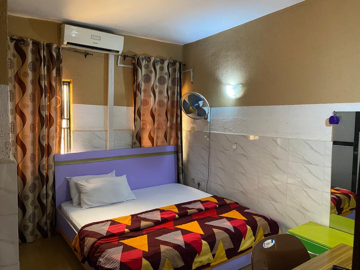 Classic Room with warm tones and comfortable bed